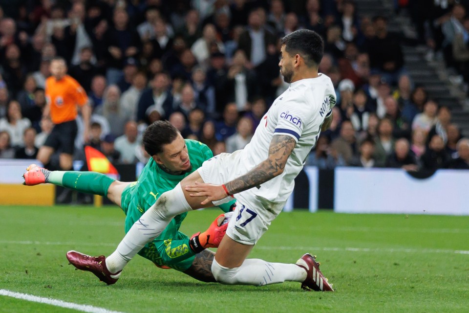 Ederson collided with Spurs' Cristian Romero