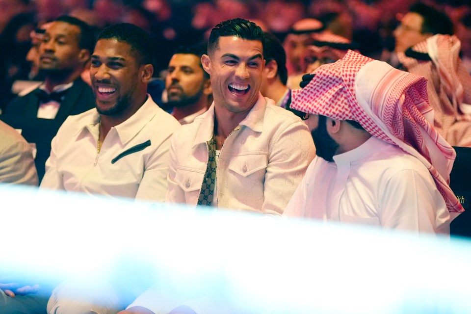 The two legends were sat alongside Turki Al-Sheikh on the front row