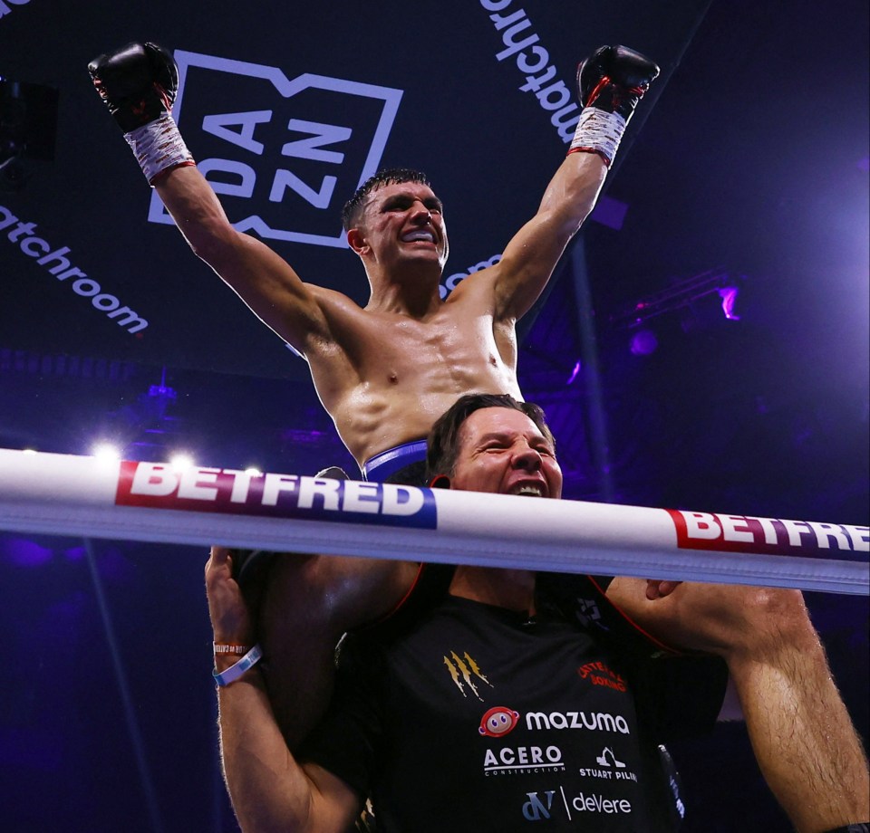 Jack Catterall celebrates his points victory over Josh Taylor