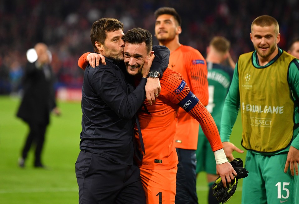 Hugo Lloris celebrates with boss Mauricio Pochettino