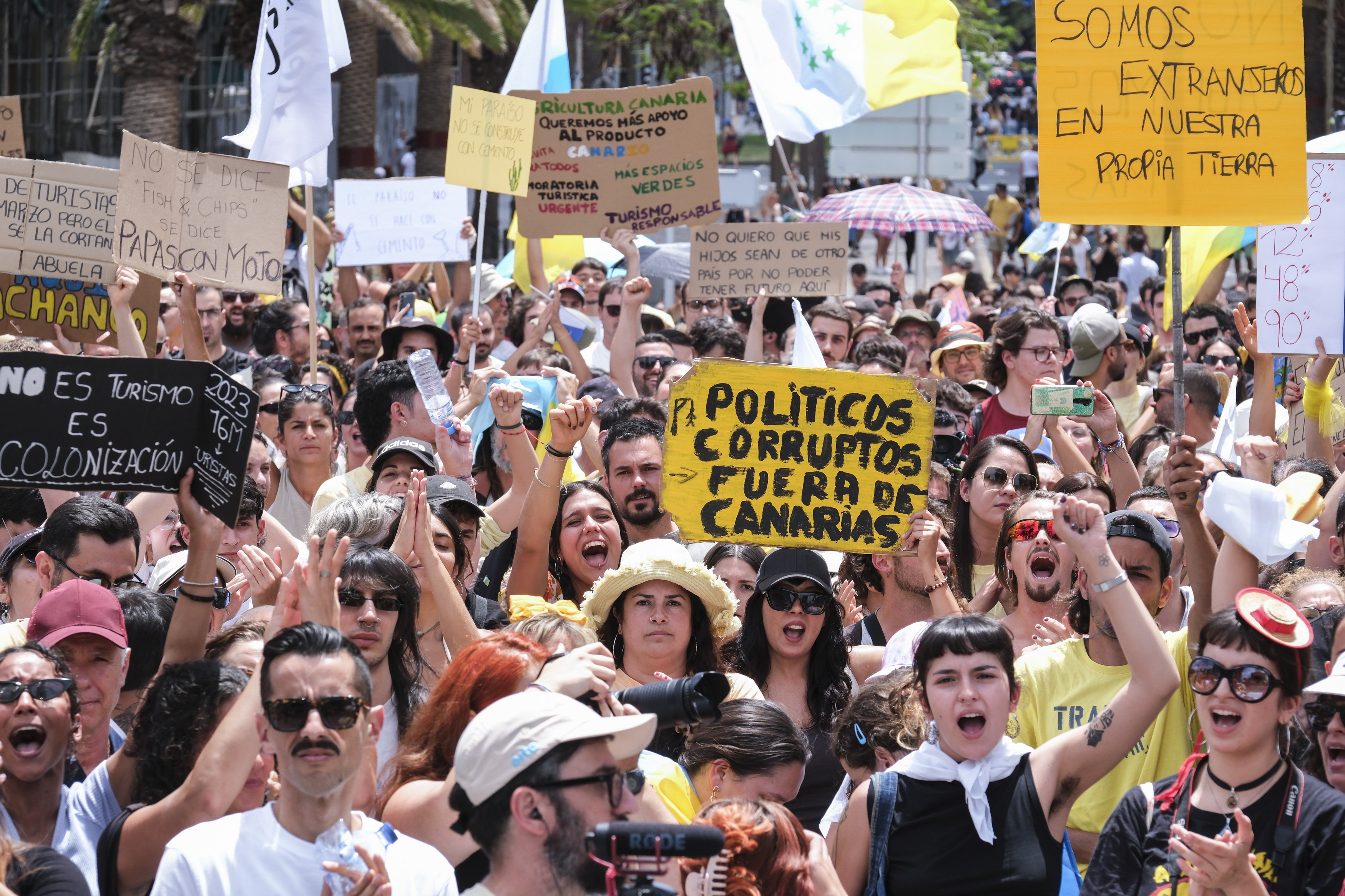 Anti-tourist protesters have been taking to the streets across Spanish holiday hotspots