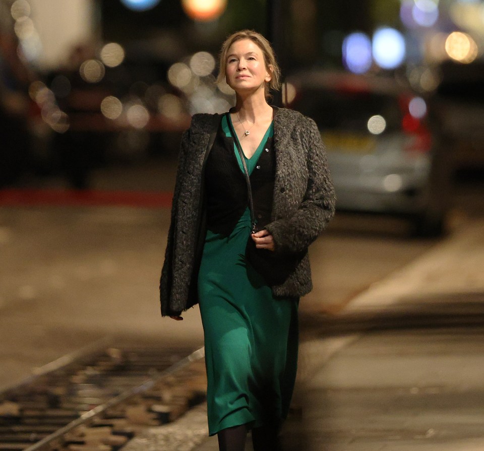 The much-loved character wore a green dress and a wool jacket