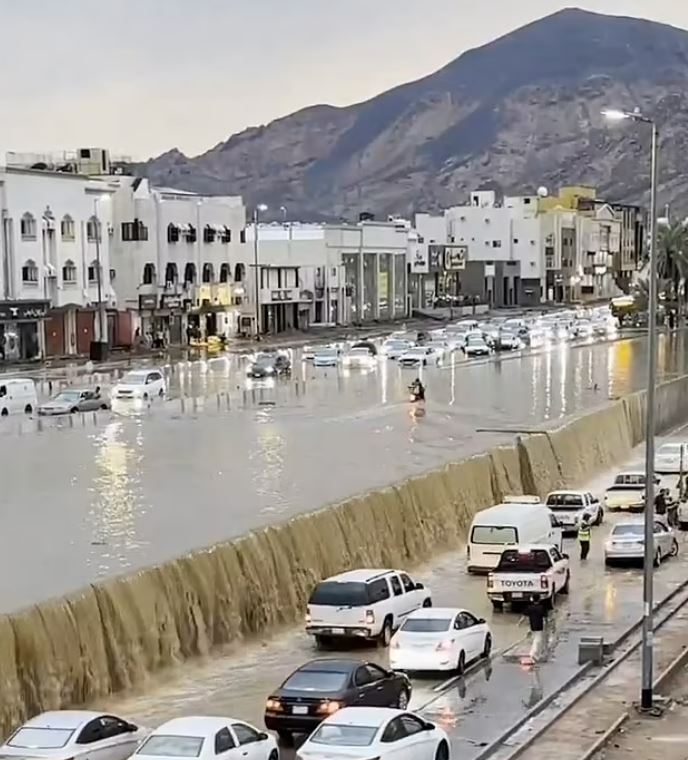 The heavy rainfall created waterfalls on the side of roads