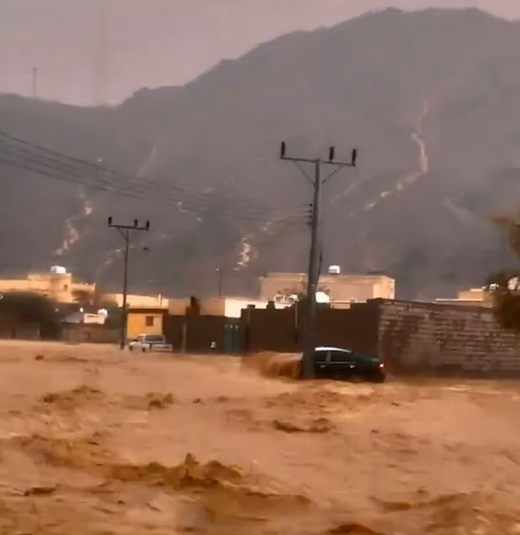 Murky floodwater was seen terrorising Saudi Arabia turning roads into raging rivers