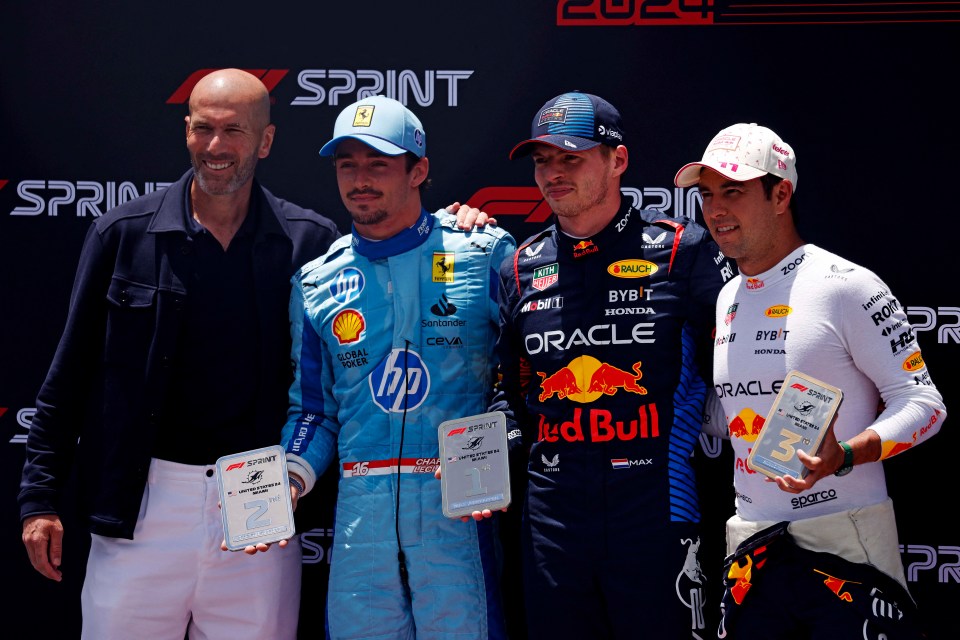 Footy legend Zinedine Zidane poses with Charles Leclerc, Max Verstappen and Sergio Perez