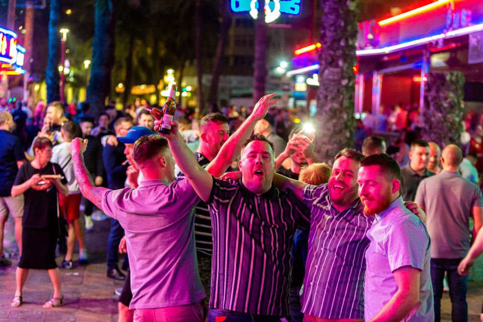 Boozed-up Brits enjoying a night out on the streets of Spain