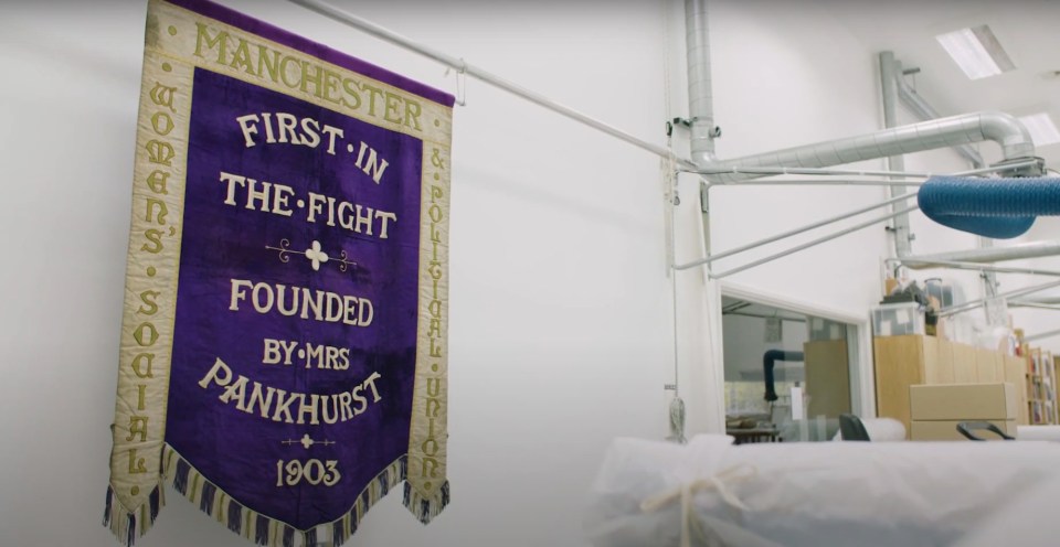 A banner hidden away in a charity shop was used at women's suffragette rallies, it has been discovered