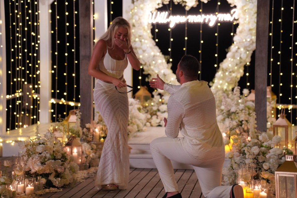 The reality star got down on one knee during a romantic proposal