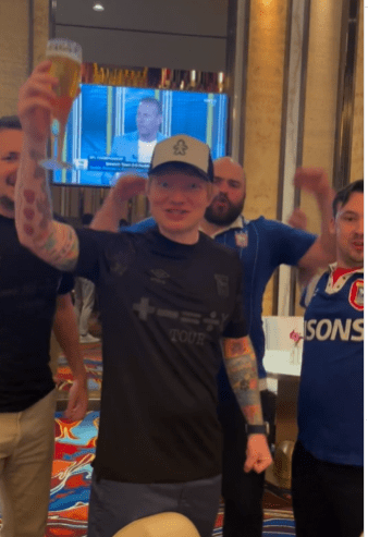 Ipswich fan Ed Sheeran celebrated from the US with a pint