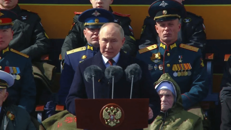 Vladimir Putin wraps himself in glory as he delivers a speech on Victory Day