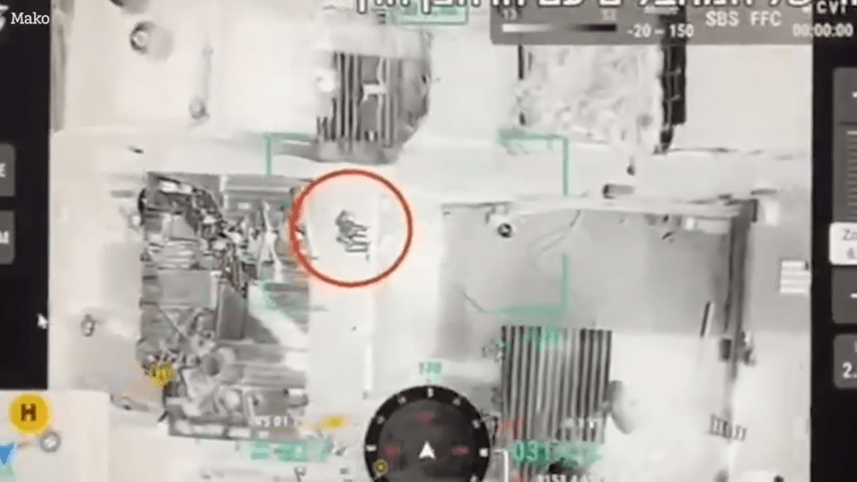 Another drone armed with an explosive device moves in on the terrorists