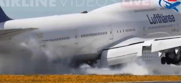 The moment the Boeing 747 touches down for the first failed landing and sends smoke billowing into the air