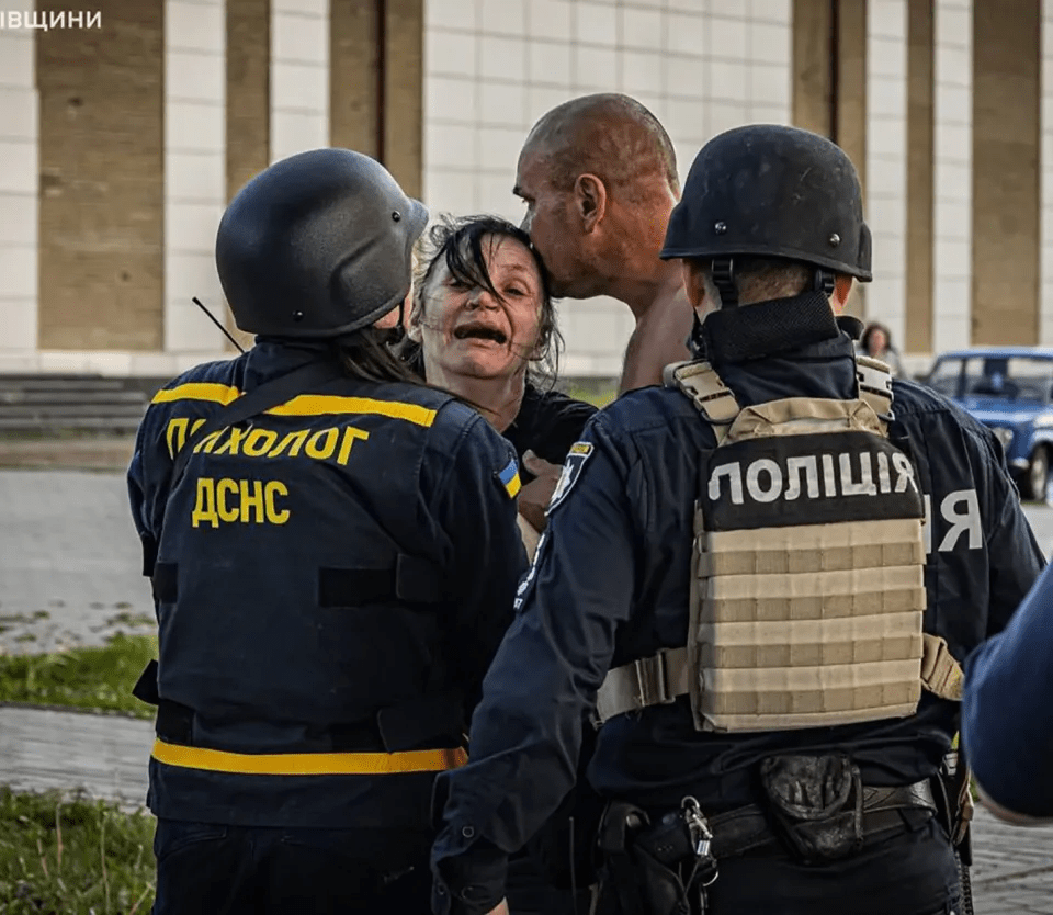 A woman was left distraught after the deadly missile attack on a Ukrainian retail park as fears grow that the number of deaths is set to rise