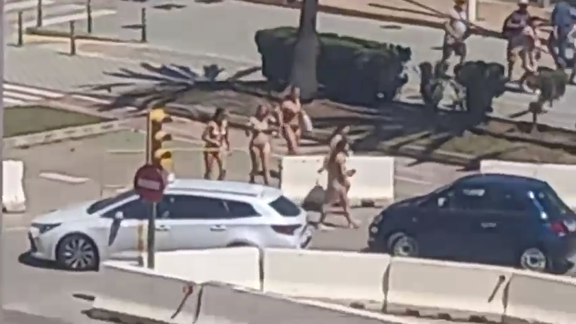 A group of tourists was seen walking around in Palma wearing just bikinis