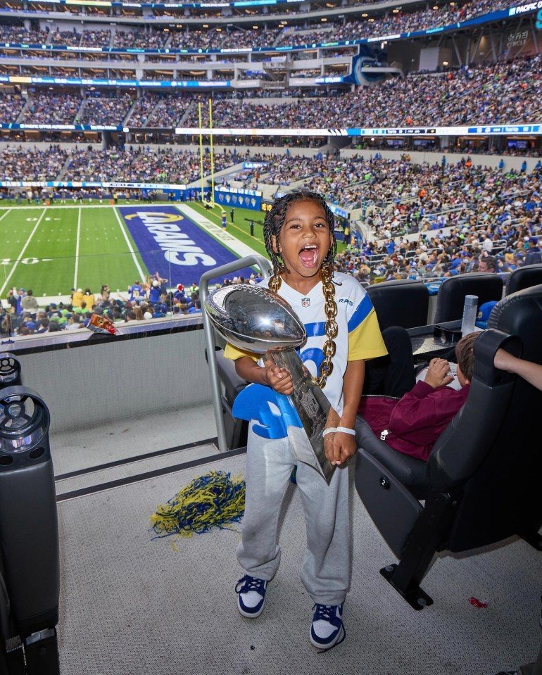 The sports-mad youngster is often seen sitting in boxes next to celebrities