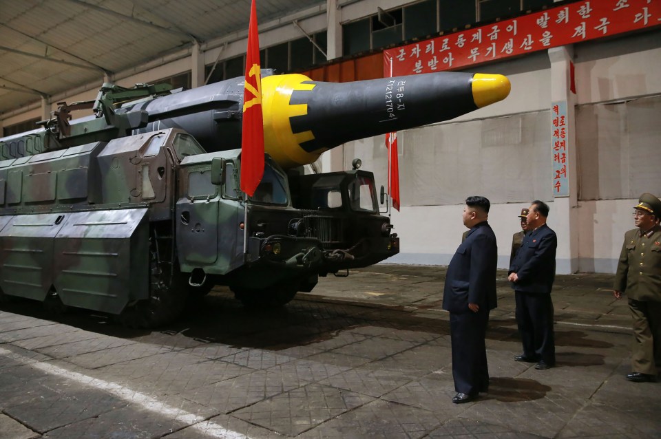 Kim inspects a ground-to-ground long-range strategic ballistic missile