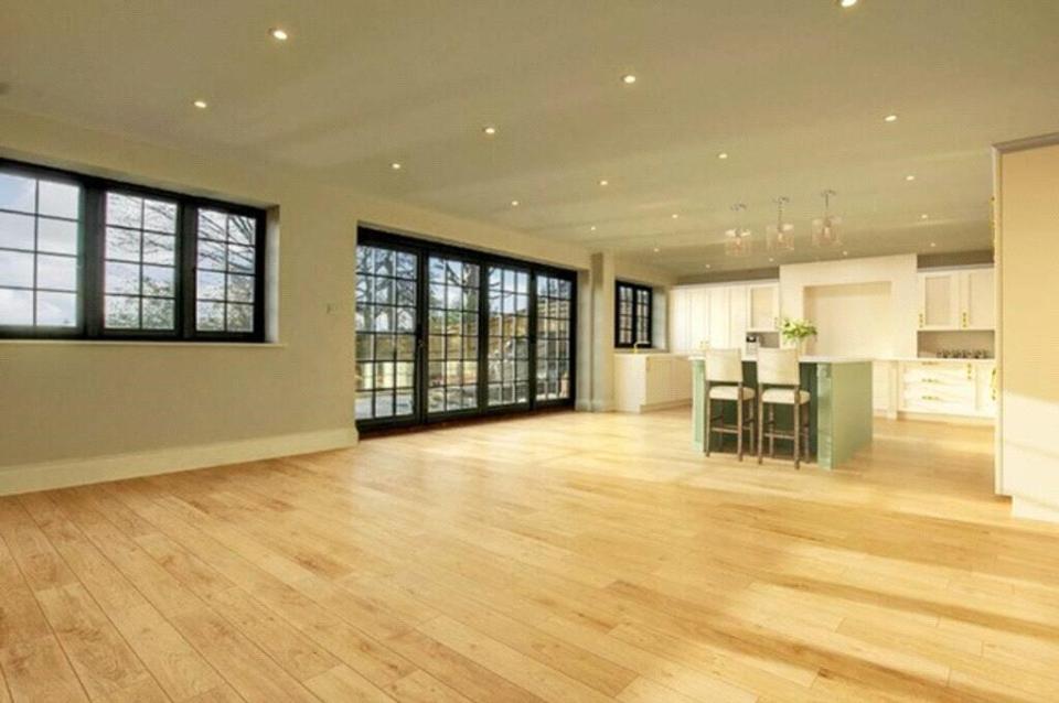 The kitchen is sprawling and boasts an island