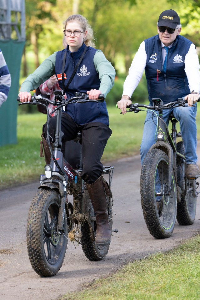 The royal was spotted helping out at the show