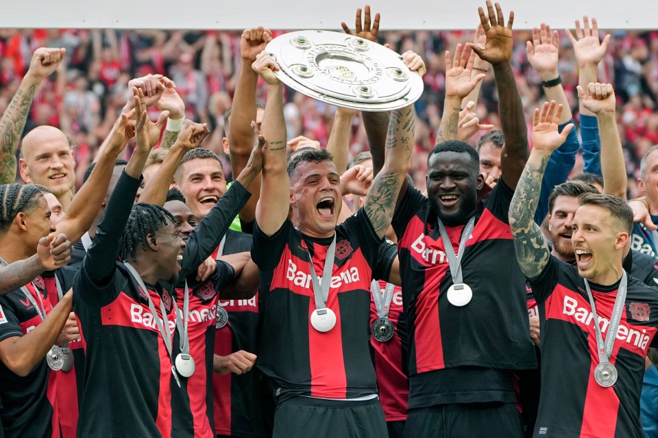 Bayer Leverkusen posted a cheeky picture of Granit Xhaka with the Bundesliga trophy