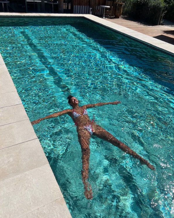 Maya cooled off in the hotel swimming pool