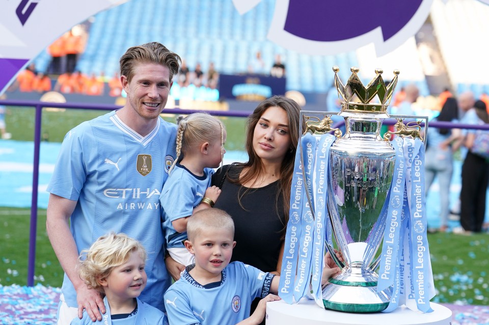 De Bruyne and Michelle celebrate City's Premier League win with their three children