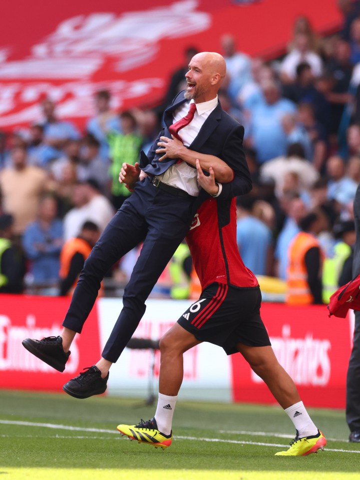 Ten Hag was hoisted into the air after the full-time whistle