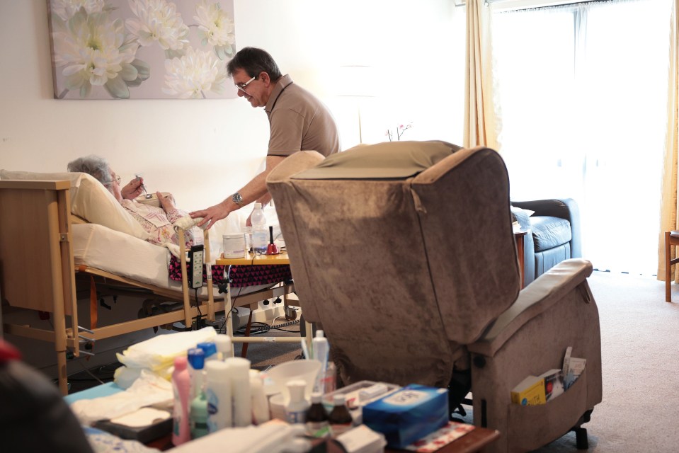 Andrew Kasparis, a full-time carer, looking after his bed-bound mother in Islington, North London