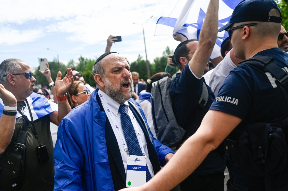 Thousands of Jews walked through the former Auschwitz death camp on Monday