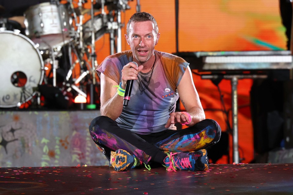 PASADENA, CALIFORNIA - SEPTEMBER 30: Chris Martin of Coldplay performs onstage at Rose Bowl Stadium on September 30, 2023 in Pasadena, California. (Photo by Monica Schipper/Getty Images)