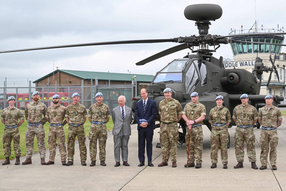 The father and son shared a touching moment in front of the Apache