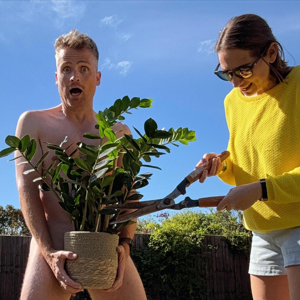 Ben could be seen holding the plant as his gorgeous NHS wife Gaby 'pruned' it