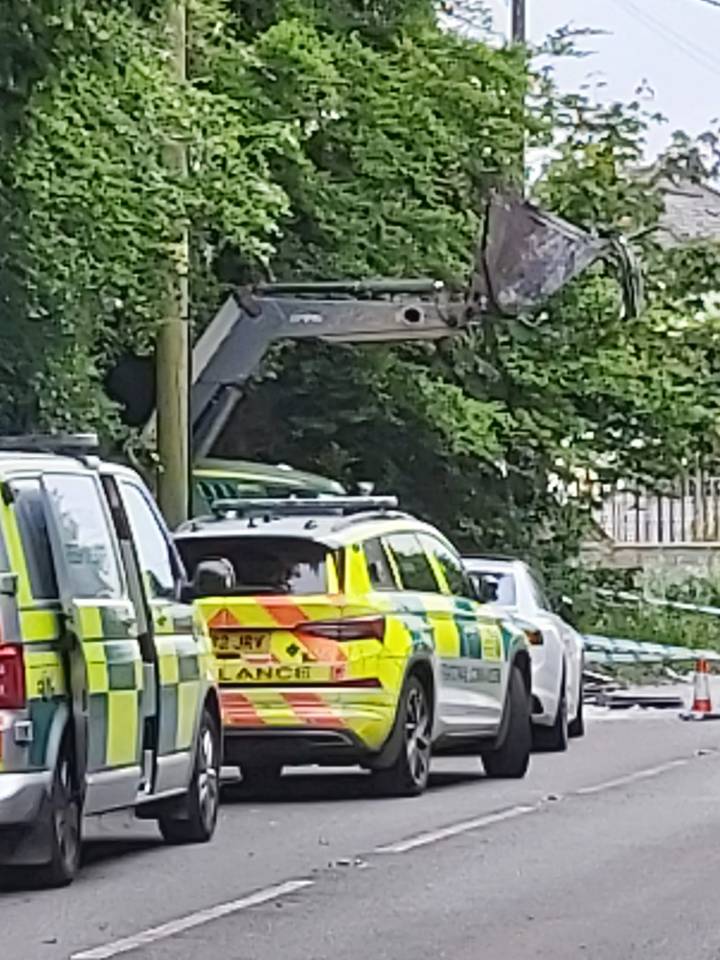 It is believed the farm vehicle had its bucket up in the air when it collided with the bus