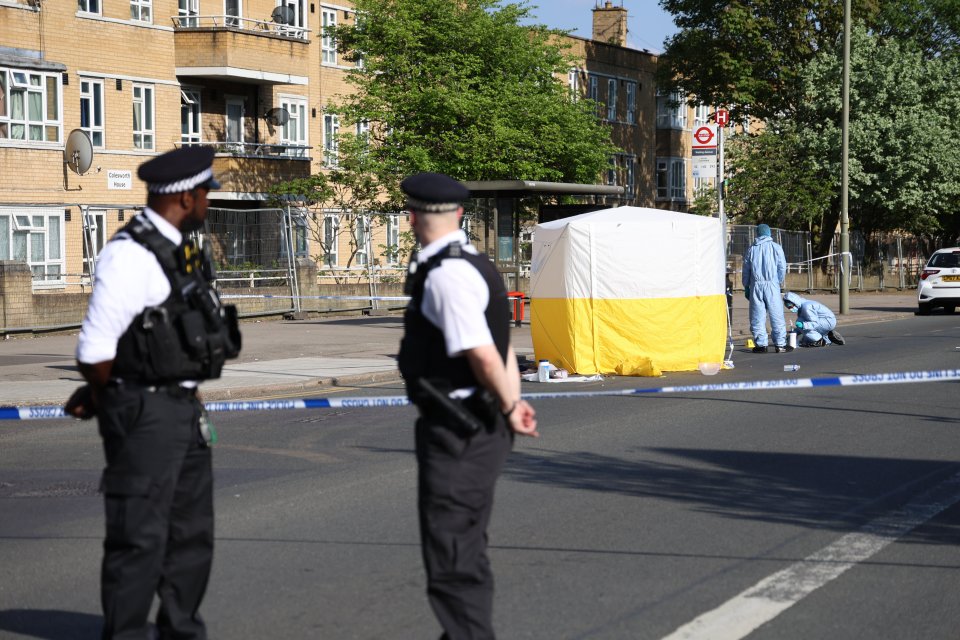 Police and forensics at the scene in Burnt Oak Broadway