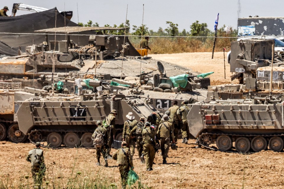 IDF tanks and troops gathering close to Israel's border with Gaza ahead of a possible full-scale invasion of the southern city of Rafah