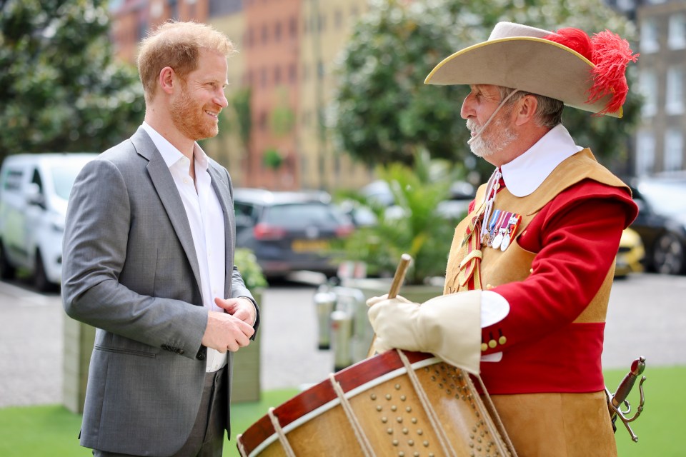 Prince Harry with a drummer at London's Honourable Artillery Company