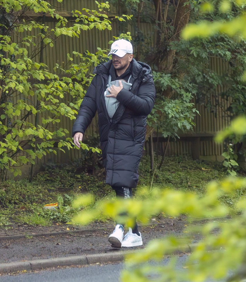 Pete looked laid back in a coat and cap