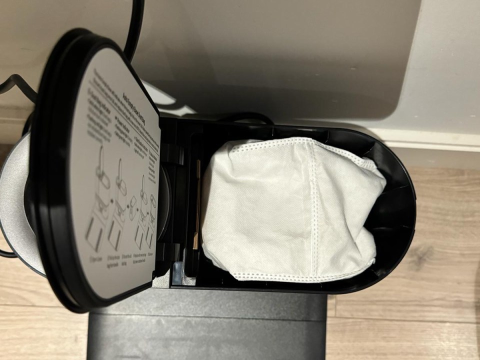 The dust bag inside the Proscenic M9's charging station takes weeks before it needs emptying