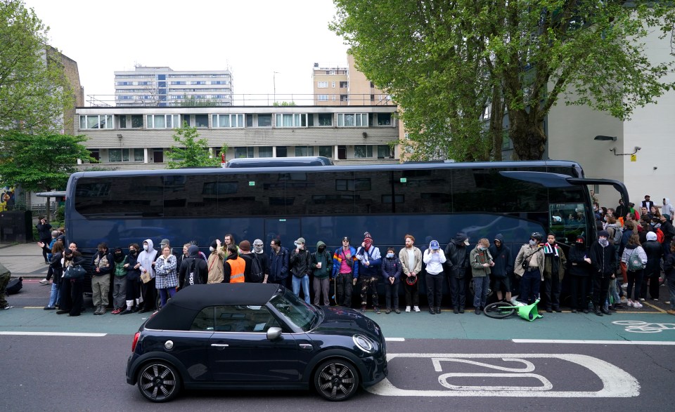 Protesters formed a blockade around the coach