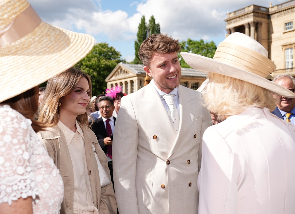 Roman Kemp was snapped chatting with the Queen at the sunny party