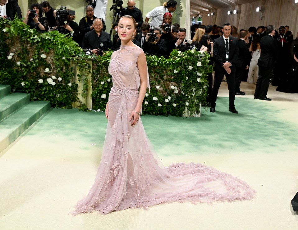 Bridgerton actress Phoebe Dynevor gracefully donned Posh’s creation of lightly folded tulle covered in flowers that was dyed to a faded rose colour