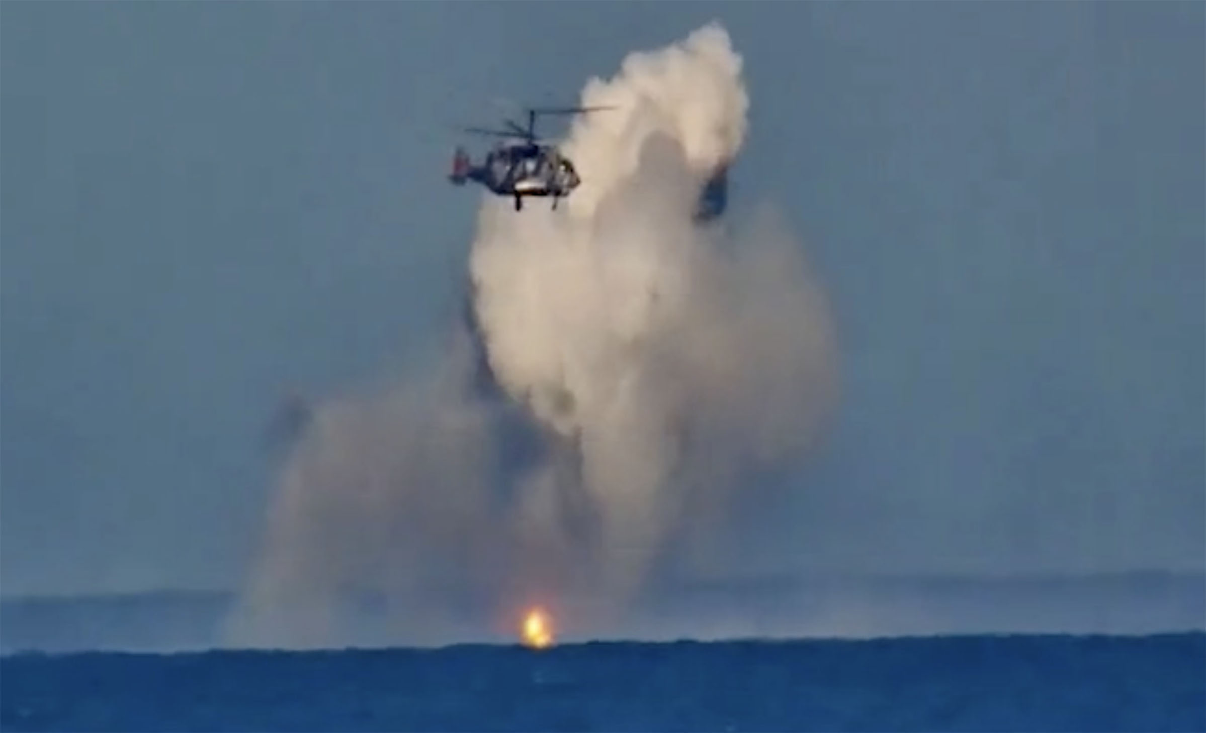 Other footage showing a Russian chopper battling Ukraine's new 'Archer' missile-shooting marine drones