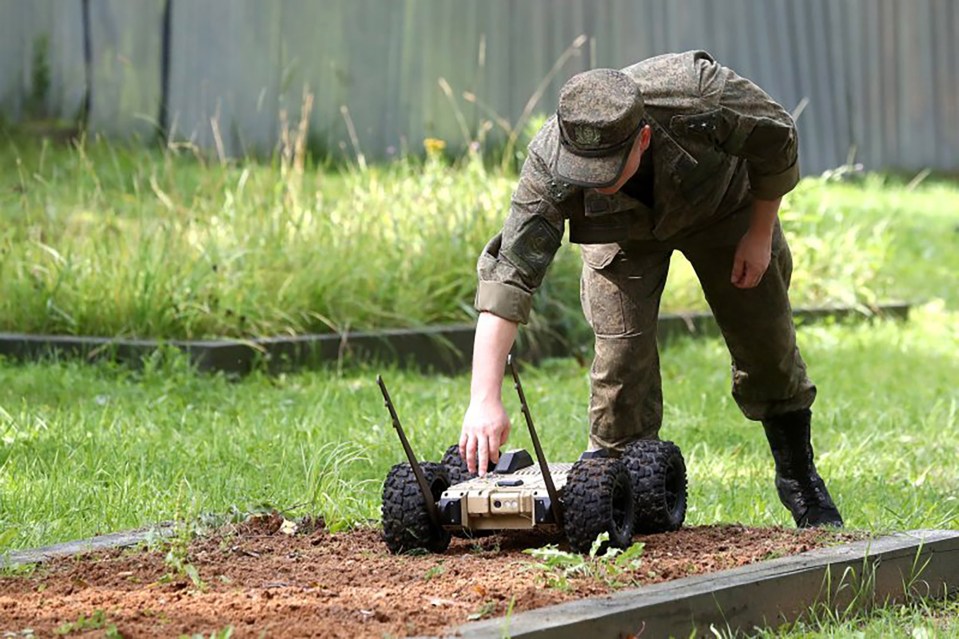 The robot is able to navigate difficult terrain and can carry 25kgs of explosives