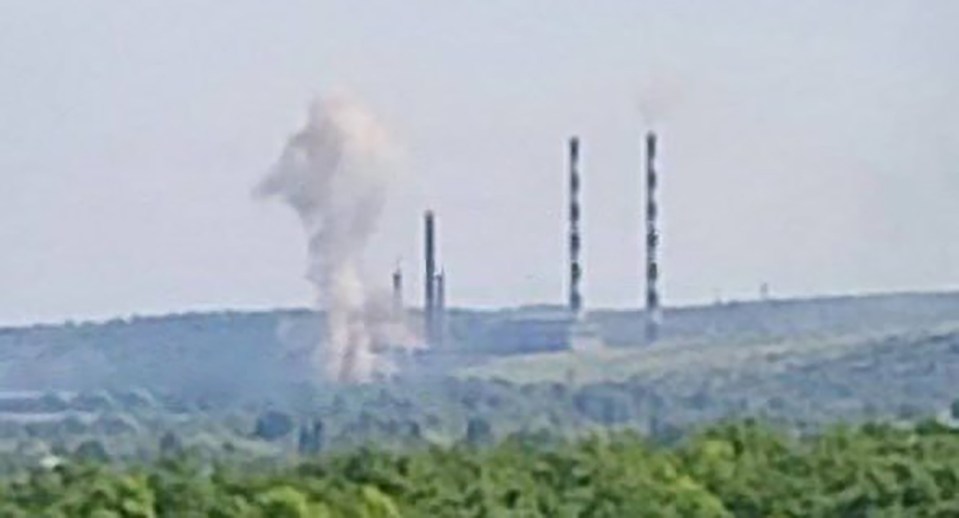 White smoke can be seen rising from the power plant after the explosion