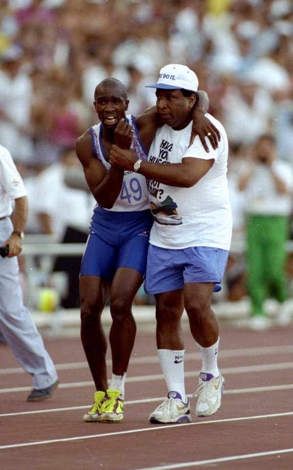 Beloved dad Jim helps British sprinter Derek Redmond limp to the finish line at the 1992 Barcelona Games