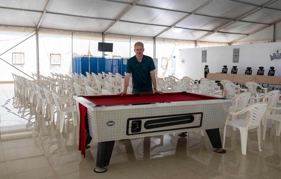 The communal marquee features a pool table