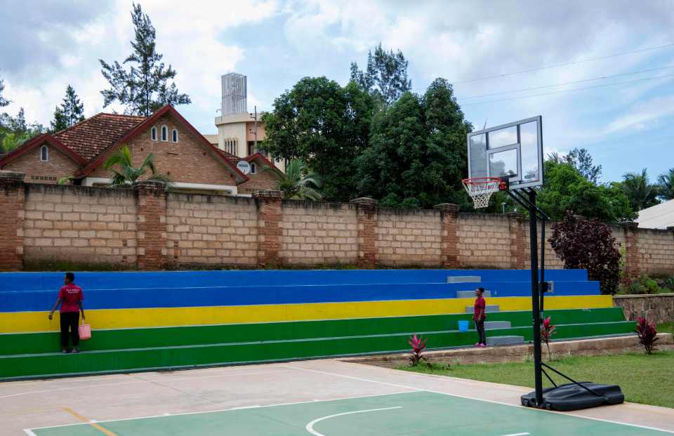 There is also a basketball court with colourful bleachers