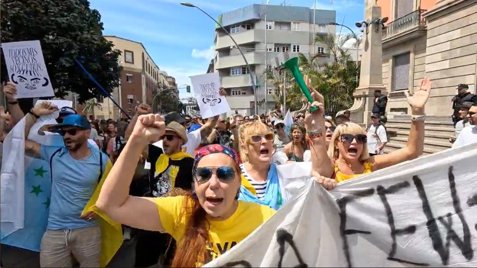 Protesters marching through Tenerife calling for stricter tourism policies