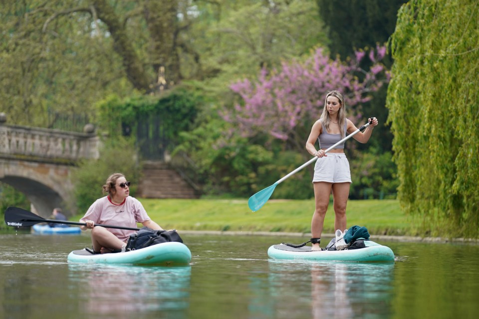 People paddleboard along the River Cam in Cambridge, May 2 (file image)