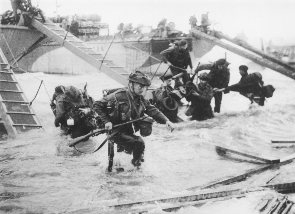 Thousands of Allied troops gave their lives at D-Day and the omission of the Union Jack has infuriated Brits - pictured here the 48th Royal Marines landing