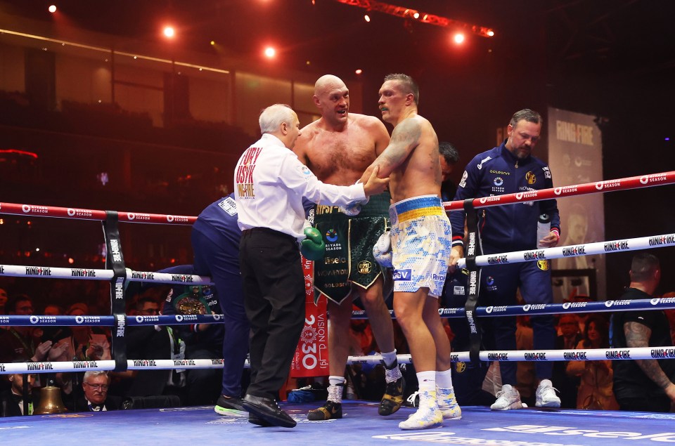 Both boxers embrace post-fight